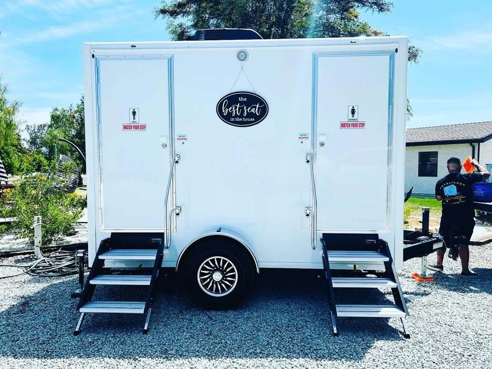 Royal Flush 2-stall luxury restroom trailer set up on site